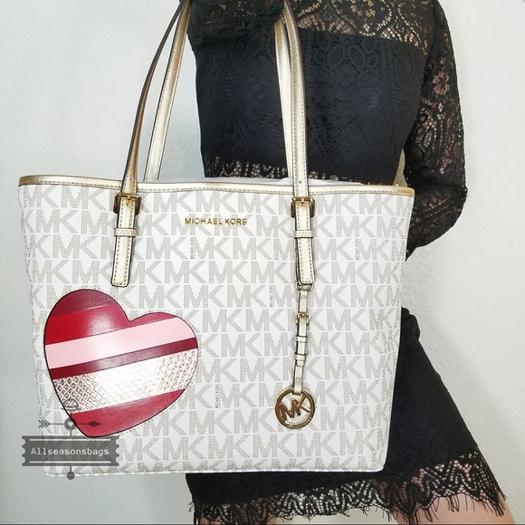 Michael Kors Handbags - NWT Michael Kors Large Medium carryall hearts Tote